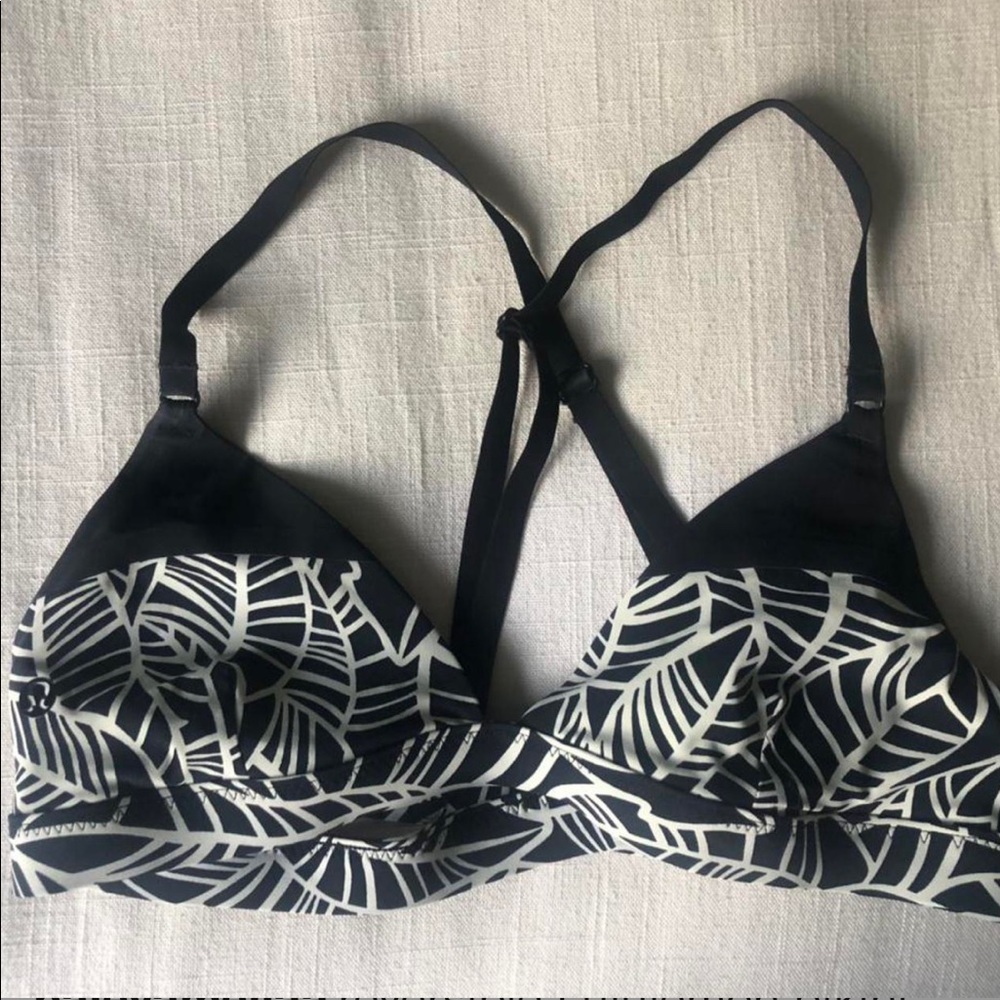 reversible Lululemon bikini top with black and white tropical print
